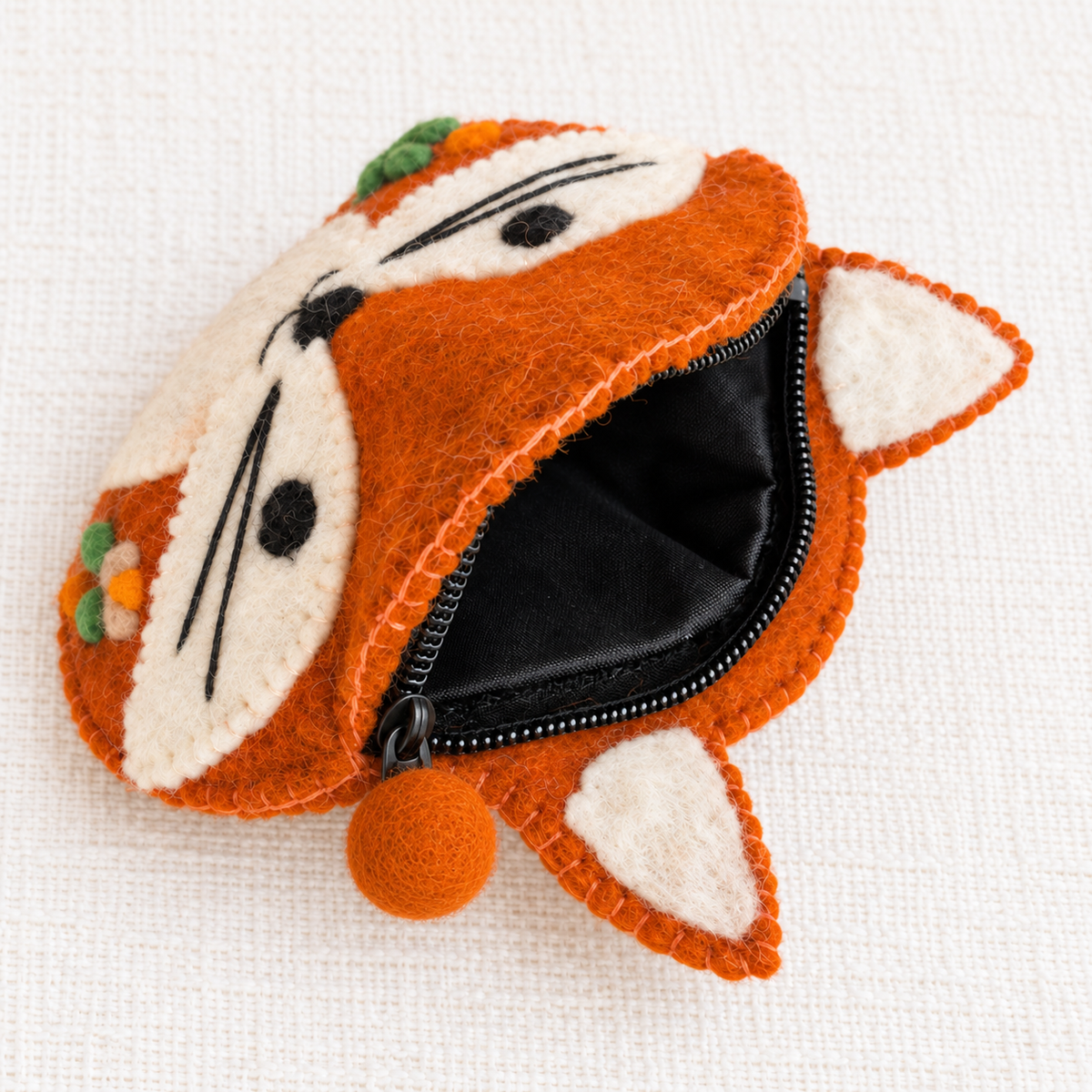 Open felt fox coin purse with pom-pom pull at the zipper tail