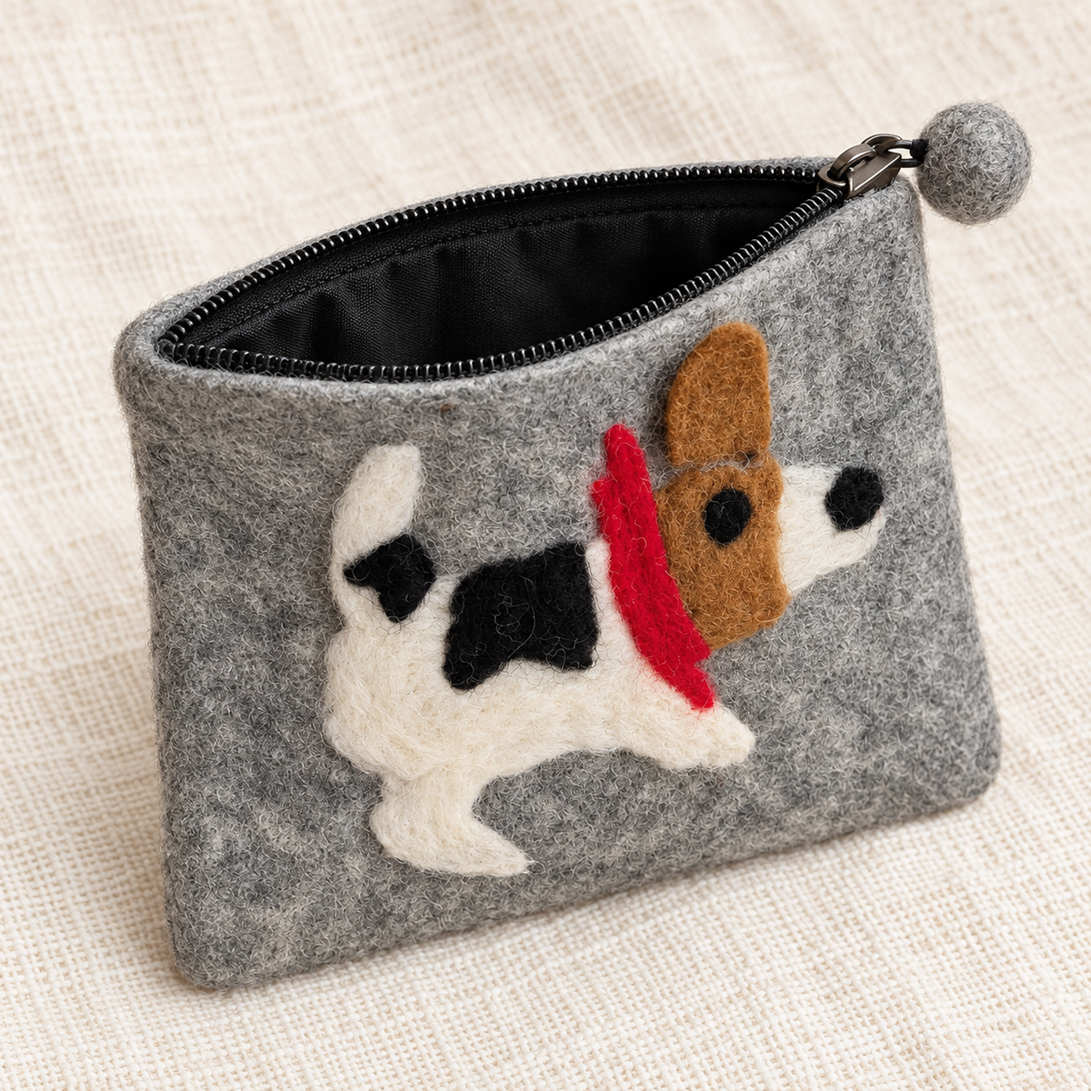 Open grey spotted dog felt coin purse showing black lining