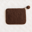 Plain back of brown felt rocking horse coin purse with pom-pom zip pull